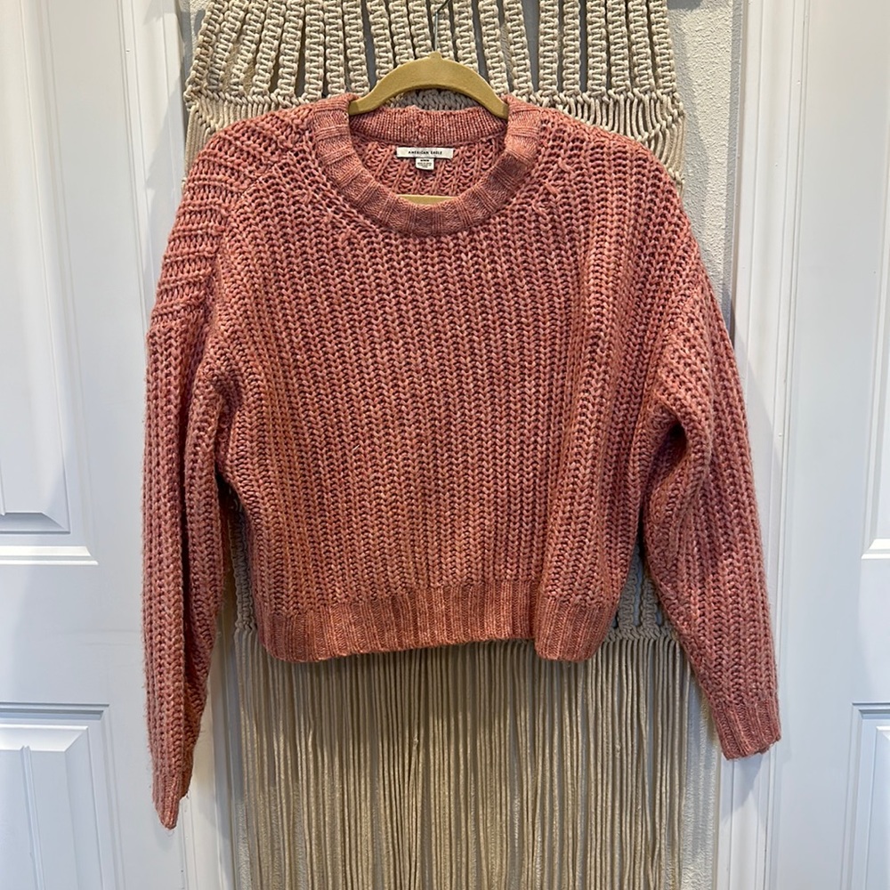 Knitted light pink sweater